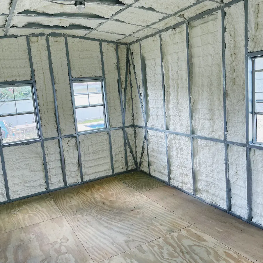 Closed-cell spray foam insulation applied to wall cavities in a residential project in North Ridgeville